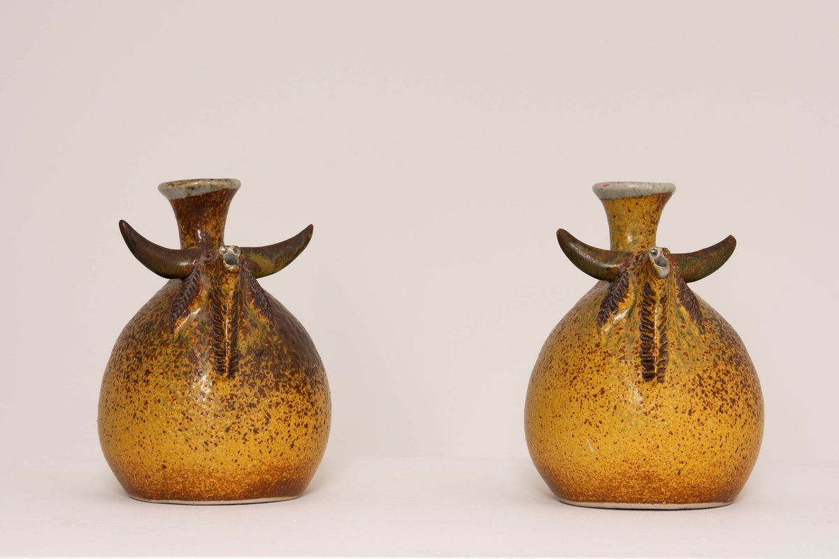PAIR OF CERAMIC BULL VASES BY JORGE MEALHA