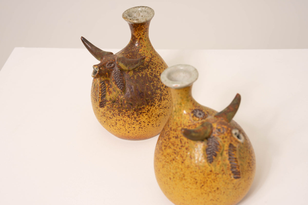 PAIR OF CERAMIC BULL VASES BY JORGE MEALHA
