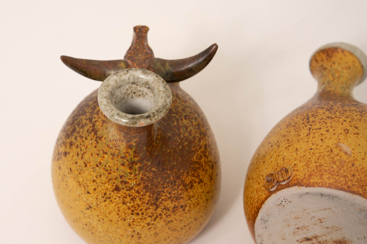 PAIR OF CERAMIC BULL VASES BY JORGE MEALHA