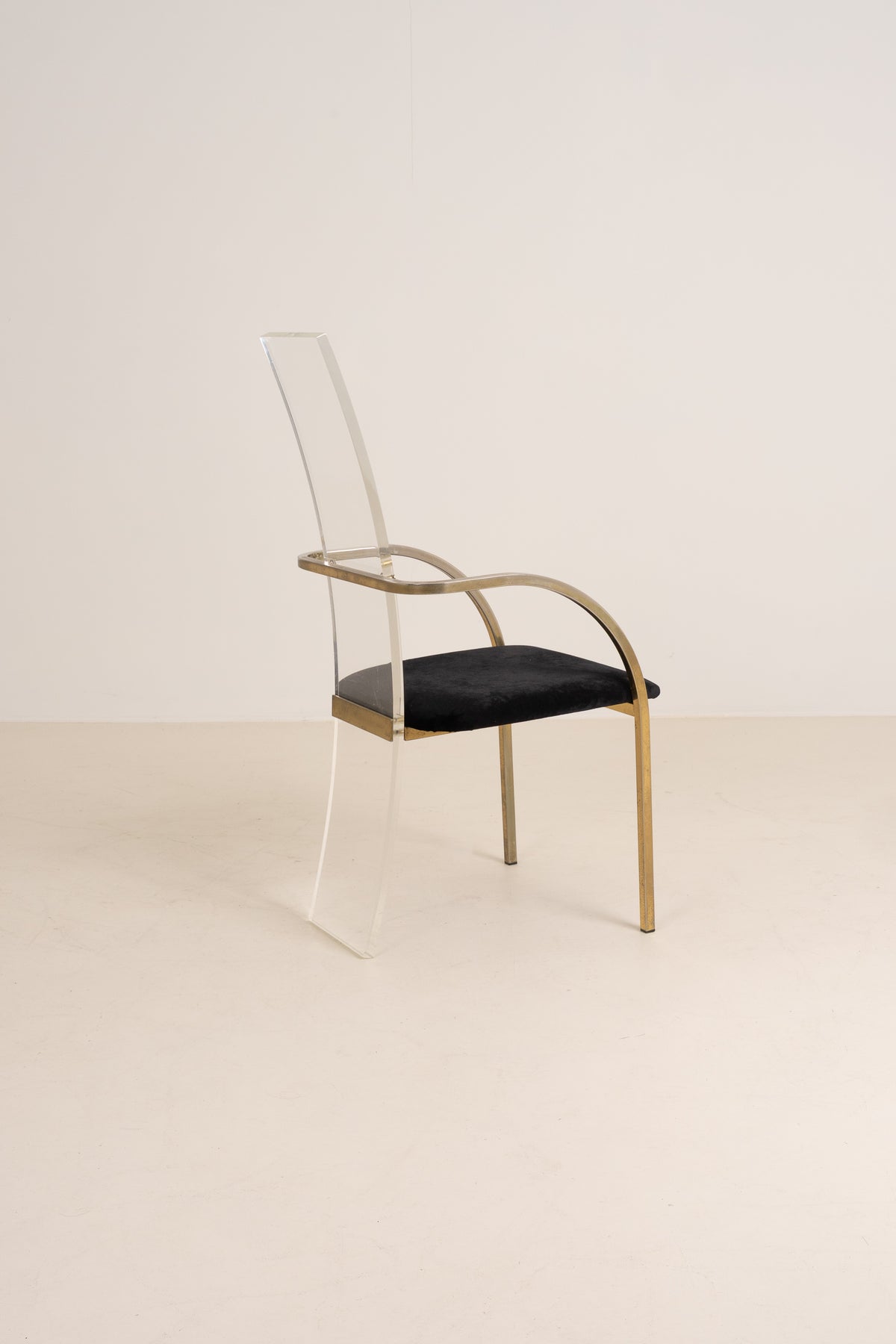 SET OF FOUR ACRYLIC AND BRASS CHAIRS BY BELGO CHROME