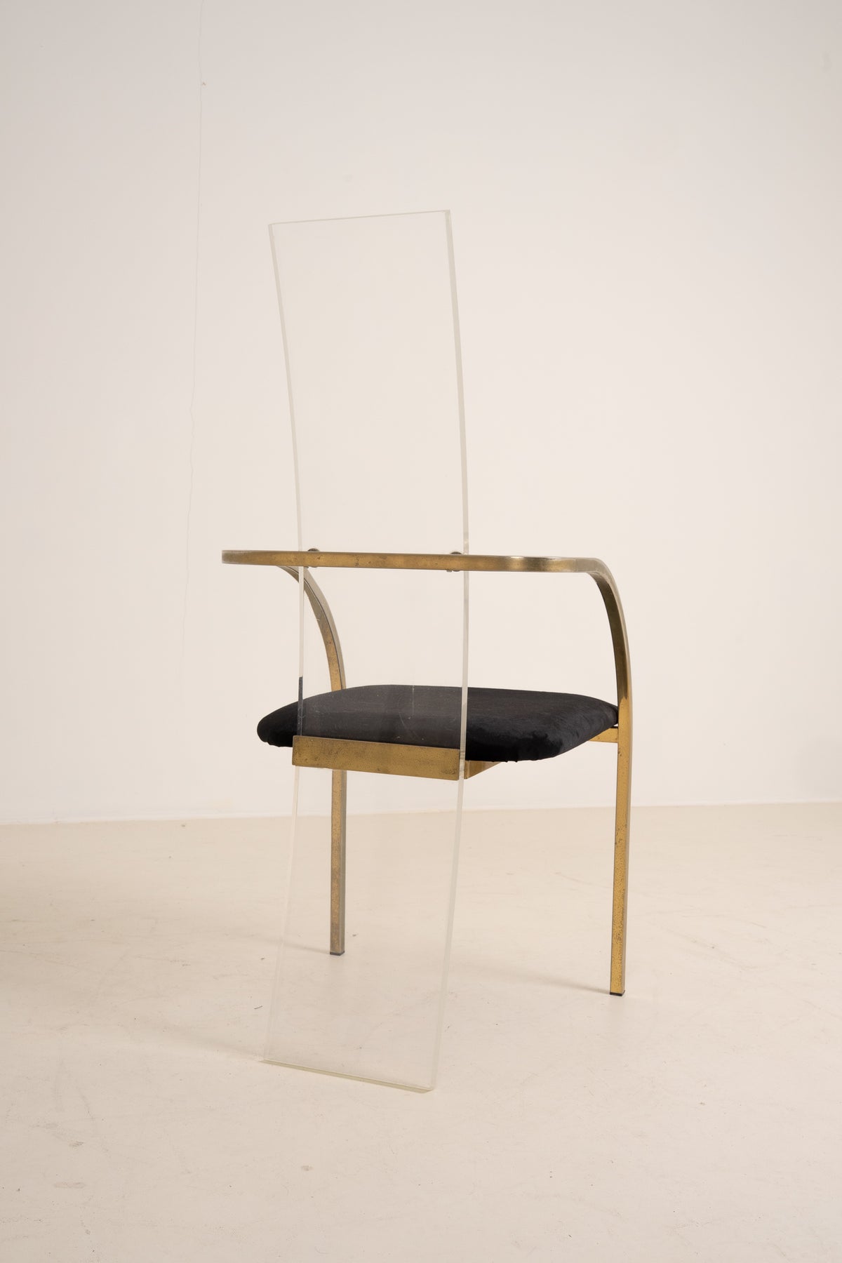 SET OF FOUR ACRYLIC AND BRASS CHAIRS BY BELGO CHROME