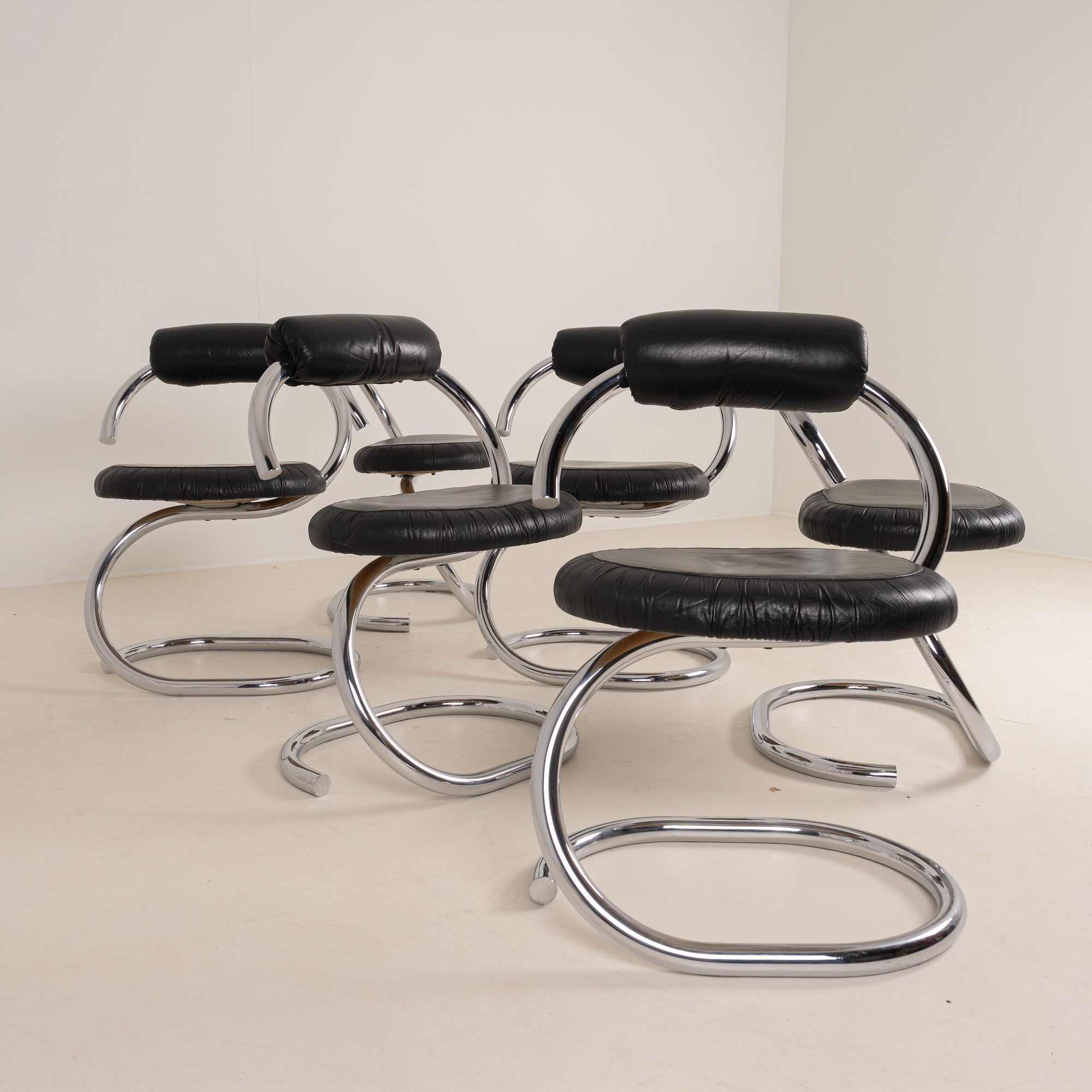 Set of 6 “Cobra” dining chairs by Giotto Stoppino