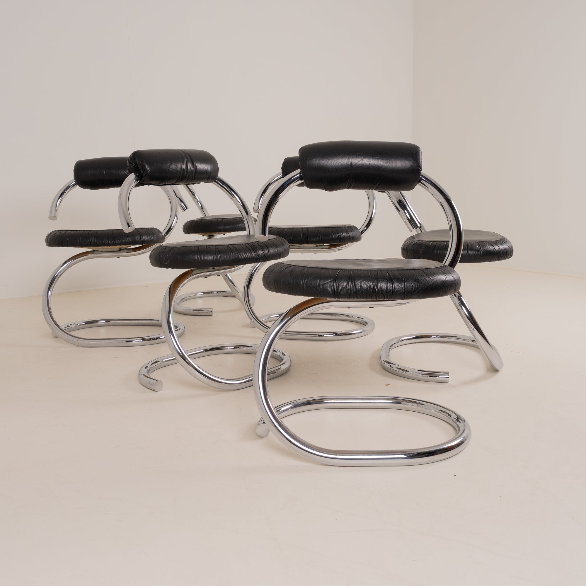 Set of 6 “Cobra” dining chairs by Giotto Stoppino