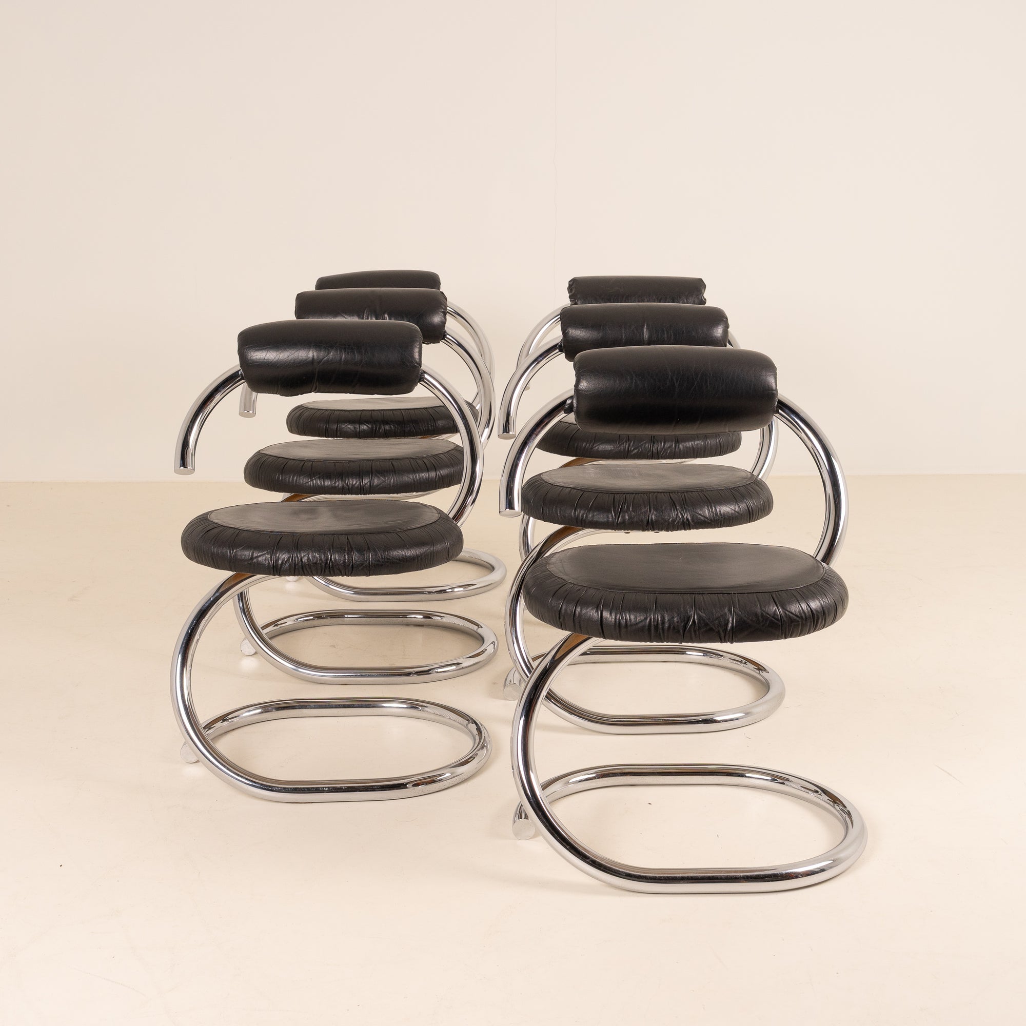 Set of 6 “Cobra” dining chairs by Giotto Stoppino